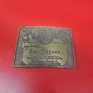Budweiser Brass-Colored Embossed Belt Buckle on Red